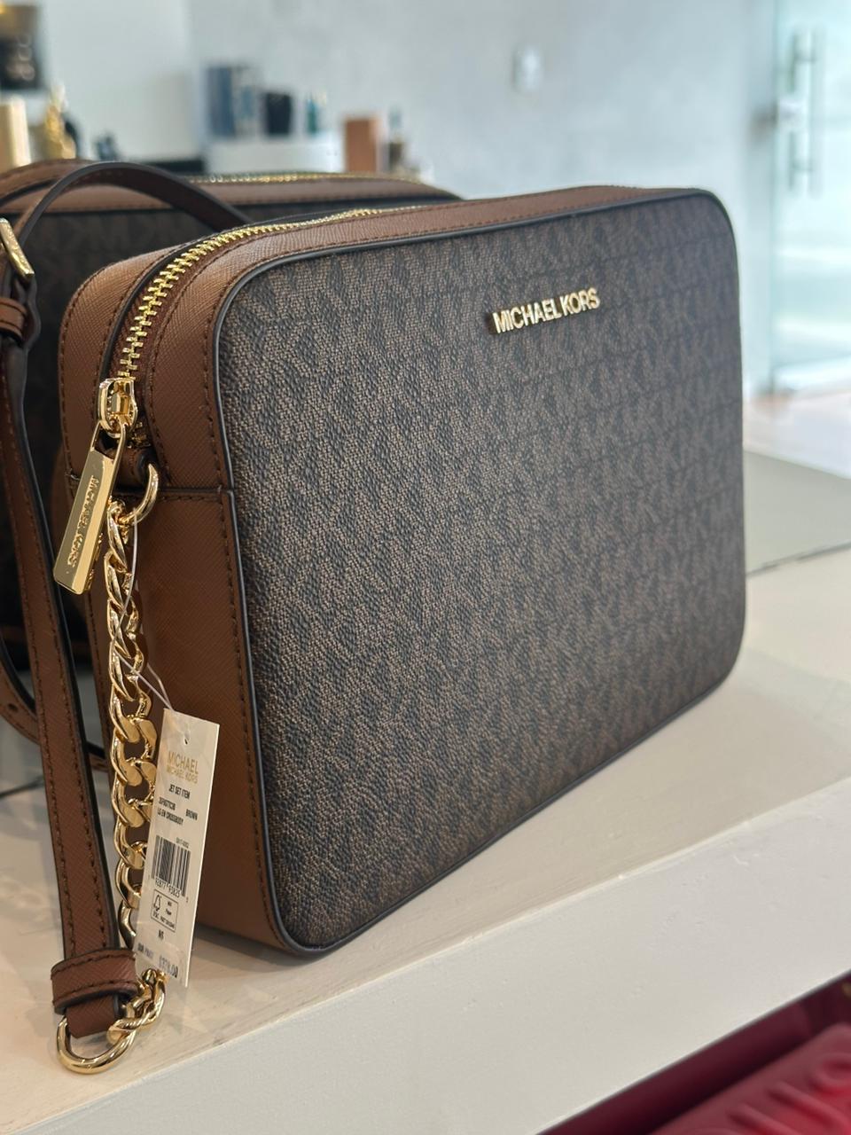 MANOS LIBRES MICHAEL KORS