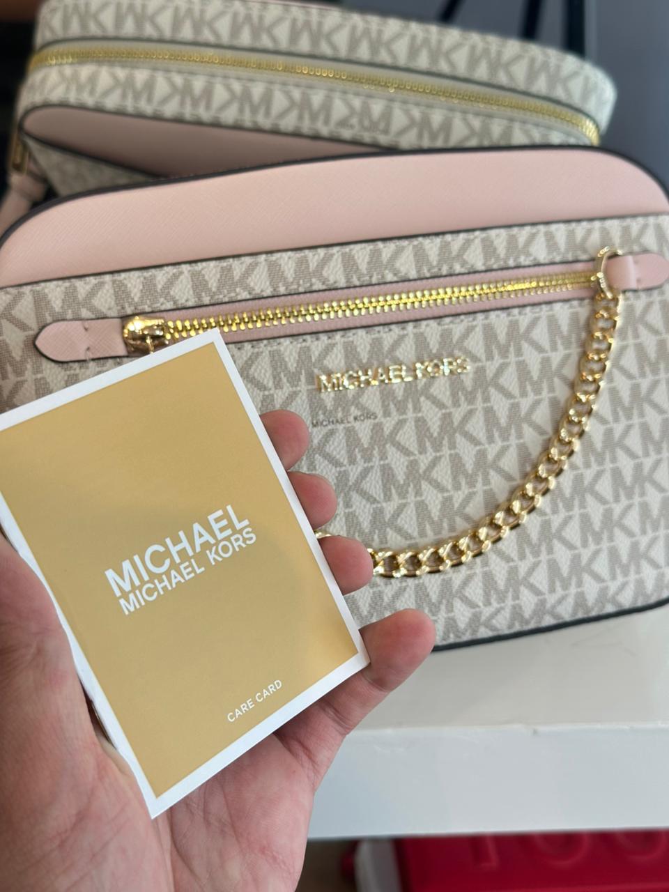 MANOS LIBRES MICHAEL KORS ROSA