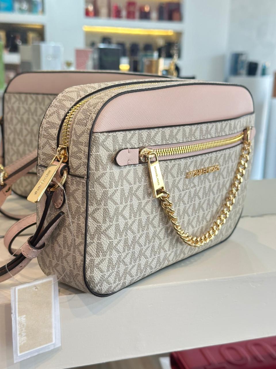 MANOS LIBRES MICHAEL KORS ROSA